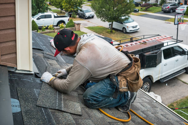 Professional Gutter Repair And Installation technician working in Palisades Park, NJ